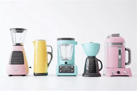 A row of different colored kitchen appliances including one of which ...