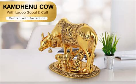 Buy GiftNagri Gold Plated Metal Handicraft Kamdhenu Cow Calf Showpiece ...