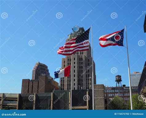 The US Flag Proudly Flies in Front of the Flag of Ohio and the City of ...