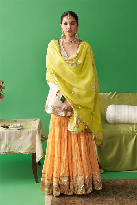 Jhoom Ivory angrakha kurta with orange garara and neon green foil prin ...