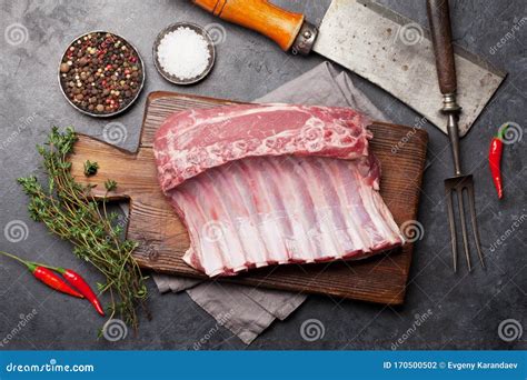 Lamb Ribs Cooking. Raw Rack of Lamb Stock Photo - Image of knife, lamb ...