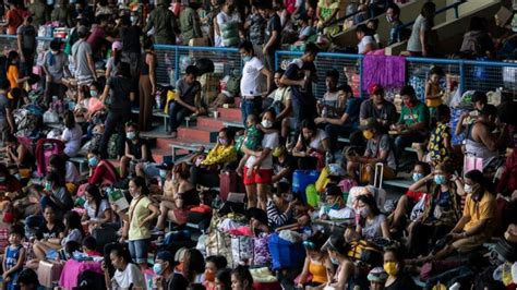 Thousands of stranded Filipinos crammed into baseball stadium amid ...