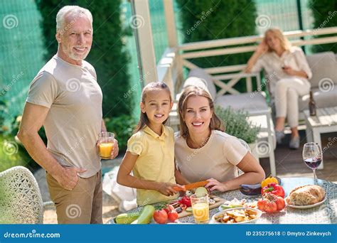 Family Preparing for the Thanksgiving Dinner and Looking Involved Stock ...