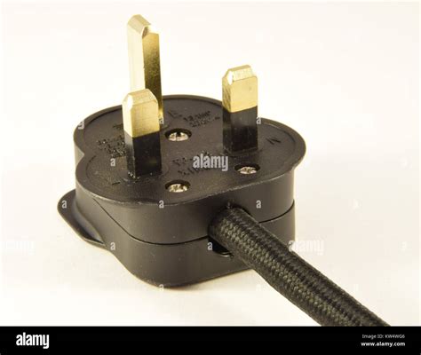 A three pin plug as used in the United Kingdom Stock Photo - Alamy