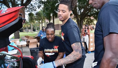 Markelle Fultz, Mother Ebony Host Fultzgiving Dinner Distribution Event for Eatonville Community ...