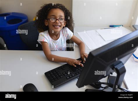 Image result for Stock Clip Child Using Desktop Computer