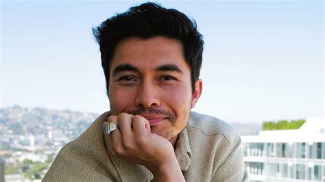 Henry Golding has the only 3 classic watches you'll ever need | GQ India