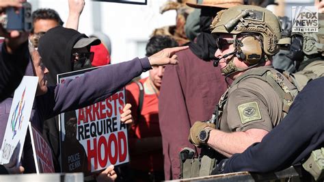 Protesters lock federal agents in Tucson taco restaurant parking lot ...