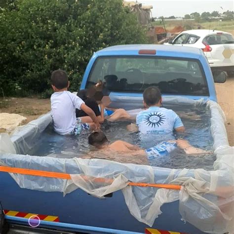 Pool-Converted Pickup With Kids Playing While In Motion Gets Pulled ...