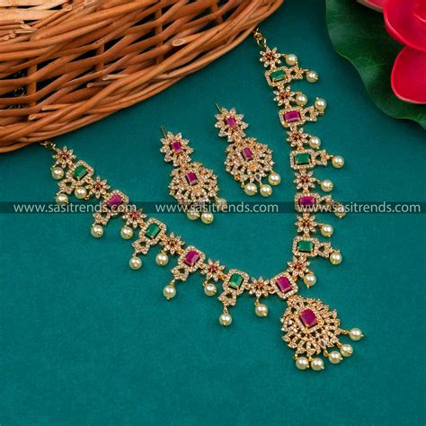Trendy Micro Gold Plated Flower Pendant AD Necklace Set - Sasitrends