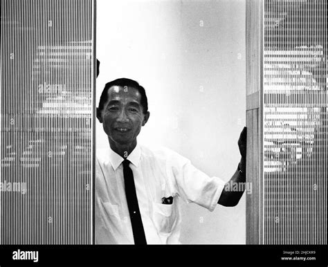 Portrait of Minoru Yamasaki, architect, with a model of the World Trade ...