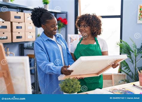 African American Women Artists Smiling Confident Looking Draw at Art ...