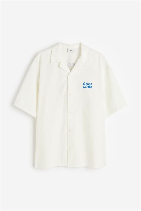 Loose Fit Resort shirt - Cream/Good Luck - Men | H&M IN
