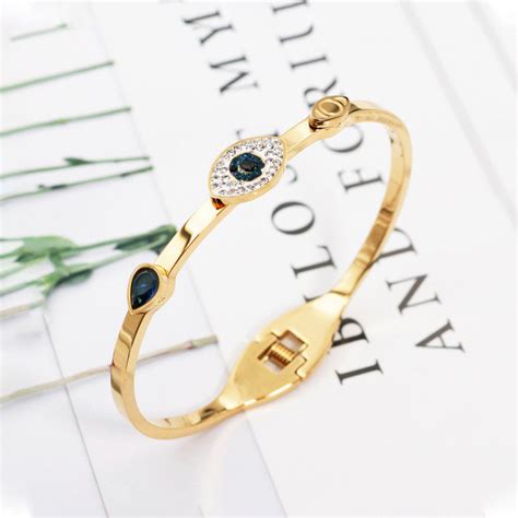 Buy Stainless Steel Gold-Plated American Diamond Evil Eye Bangle-Style ...