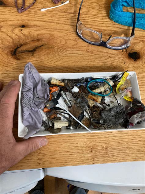 Image result for Unblocking Filter On a Washing Machine