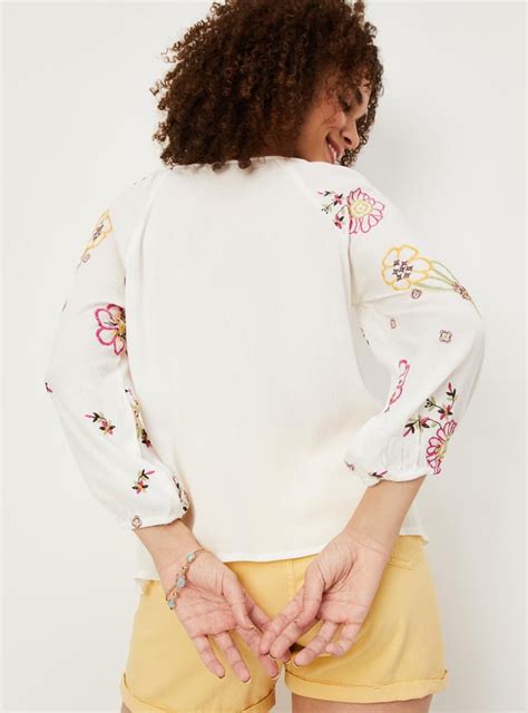 Buy Women Embroidered Tie-Up Neck Tunic Online at just Rs. 899.0 ...