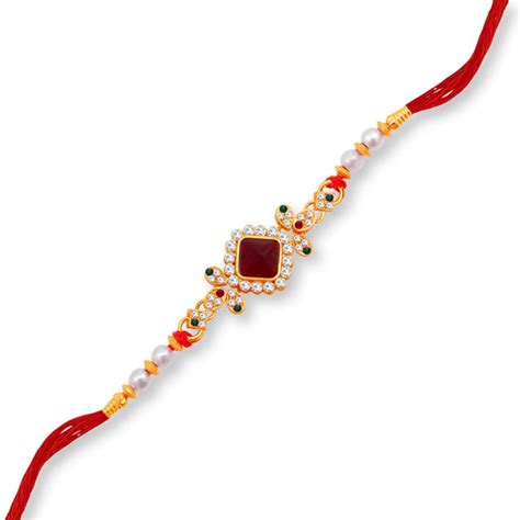 Sukkhi Designer Gold Plated Rakhi with Roli Chawal and Raksha Bandhan ...