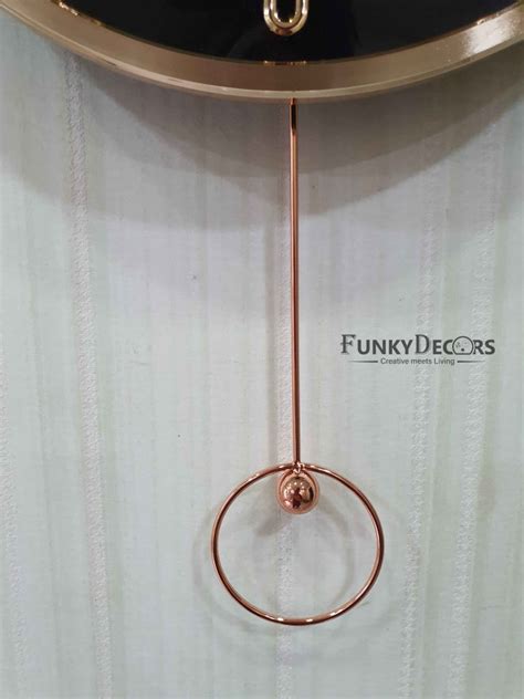 FunkyTradition Rose Gold Multicolor Reindeer Pendulum Wall Clock, Wall