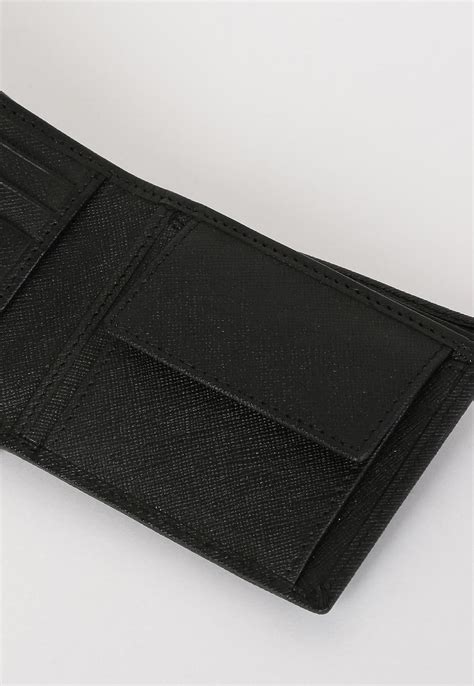 Buy Men Textured Bi-Fold Wallet Online at just Rs. 699.0 ...