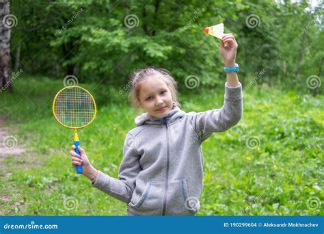 Little Girl Playing Badminton on the Street Stock Photo - Image of cute ...