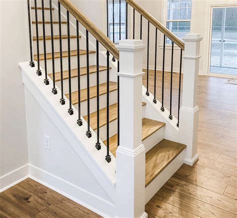 White Staircase with Wooden Handrails
