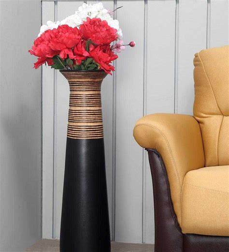 Buy Tribal Thread Brown Wood Floor Vase at 55% OFF by @home | Pepperfry