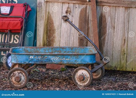 Antique, Rusty, Blue, Radio Flyer Wagon Editorial Photo - Image of pull ...