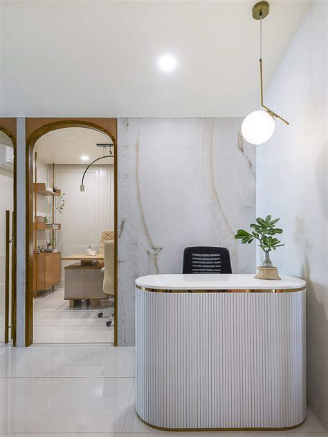 A mix of arches and stripes forms the foundation of this office ...