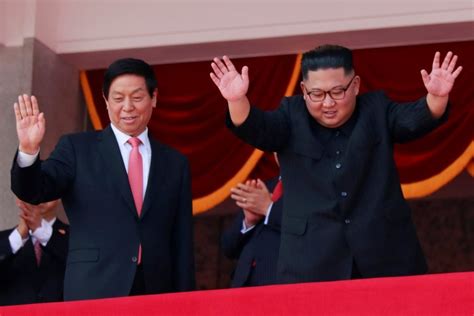 North Korea Holds Military Parade, No Long-Range Missiles on Display ...