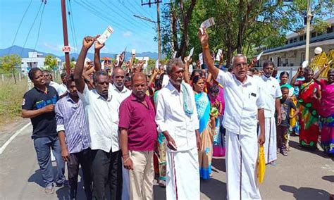 Villagers protest at the Tenkasi Collector's Office to hand over their ...