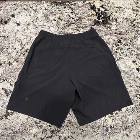 Black Lululemon shorts -basically brand new - Depop