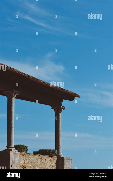 Vertical shot of an aged building with columns under a sunny sky Stock ...