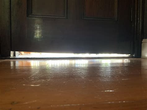 How to address large, uneven gap under front door 🚪 : r/DIY