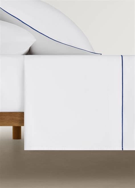 Cotton percale top sheet with contrasting overlock stitching for 135/ ...