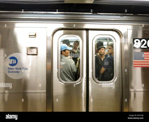 Riding the subway nyc hi-res stock photography and images - Alamy