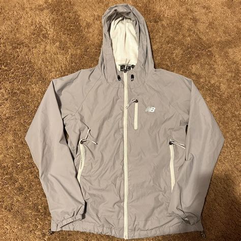 Grey New Balance windbreaker jacket size M pocket... | Depop