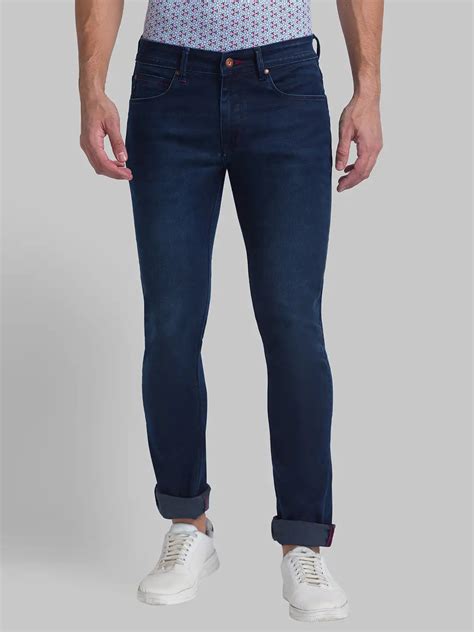 Men Blue Slim Fit Solid Cotton Blend Jeans – MyRaymond