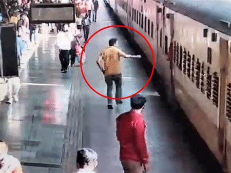 Surat Man Falls on Train Track, Narrowly Escapes | CCTV Rescue
