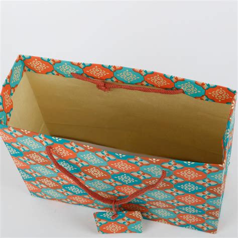 Buy Oxley Printed Gift Bag with Tag from Home Centre at just INR 199.0