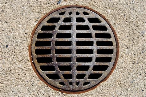 Pin by Mitsuhiro Obora on Maru_Circle | Drain cover, Stock photos, Concrete