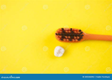 Tooth Brush and Milk Teeth on Yellow Background Stock Photo - Image of ...