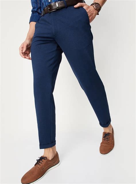 Buy Men Solid Knit Carrot Fit Formal Trousers Online at just Rs. 1499.0 ...