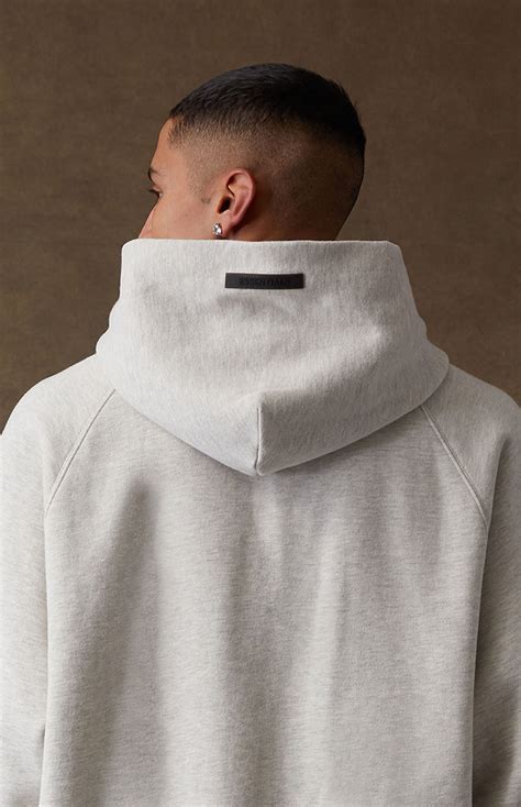 Fear of God ESSENTIALS Light Oatmeal Hoodie | Pacsun