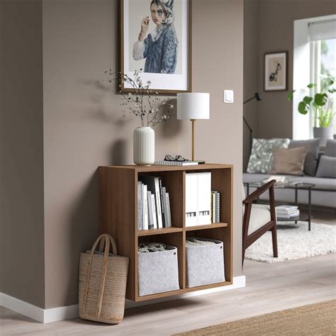 EKET wall-mounted shelving unit w 4 comp, walnut effect, 70x35x70 cm ...