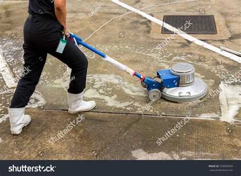 Exterior concrete floor cleaning with polishing machine and chemical ...