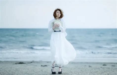 Download wallpaper sea, girl, angel, section girls in resolution 1024x600