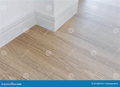 Wood floor with white wall stock photo. Image of hardwood - 221883310