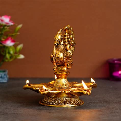 Golden Peacock Designer Diya Metal Stand - eCraftIndia Online