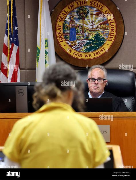 Judge Robert Hodges, right, listens as Susan Lorincz, who fatally shot a Black neighbor through ...