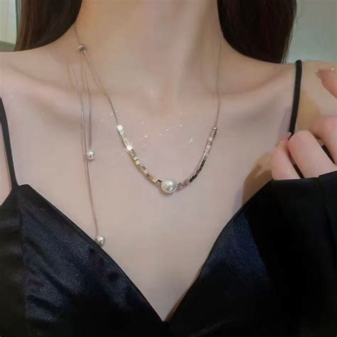 Shimmering Love Knot Pearl Necklace | Salty – Salty Accessories